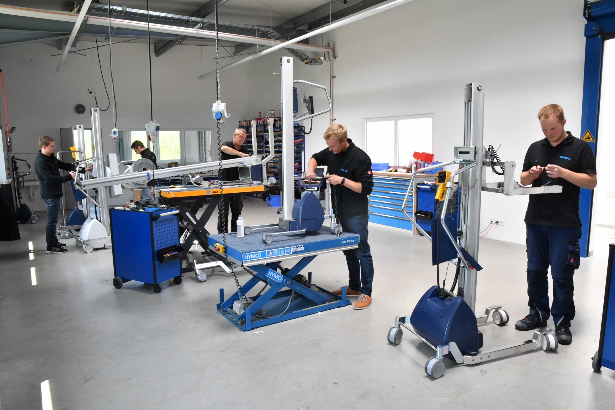 Mitarbeiter von TransOrt zu sehen, die am arbeiten sind